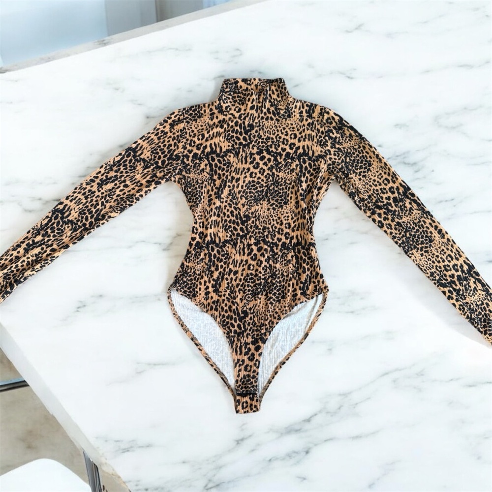 Forever 21 Tan and Black Kids Bodysuit